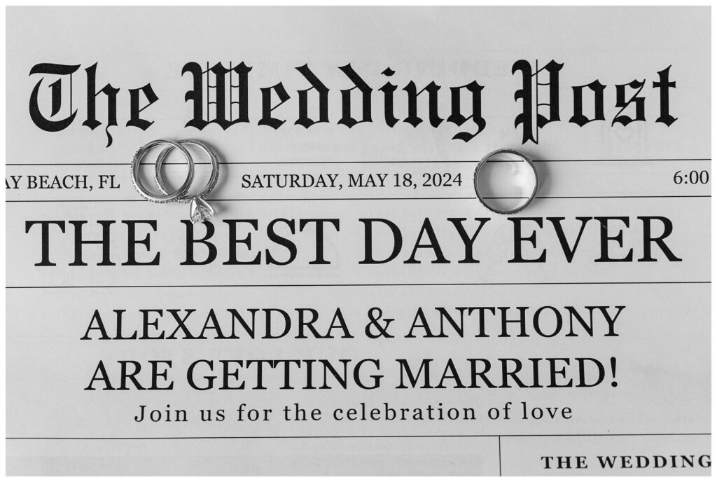 The Ray Hotel Wedding wedding newspaper with wedding rings