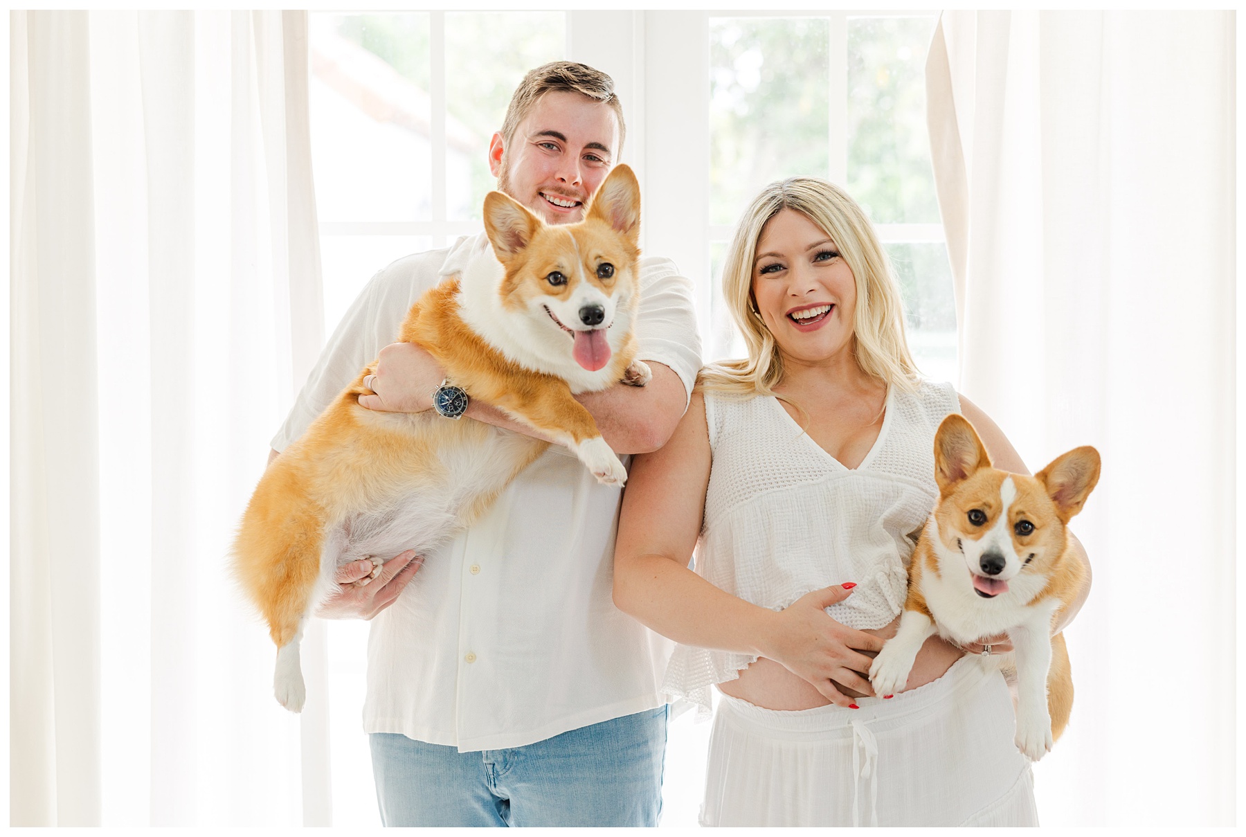 Hannah and Andrew with their dogs for their studio maternity photo shoot at The Rich Hippies House