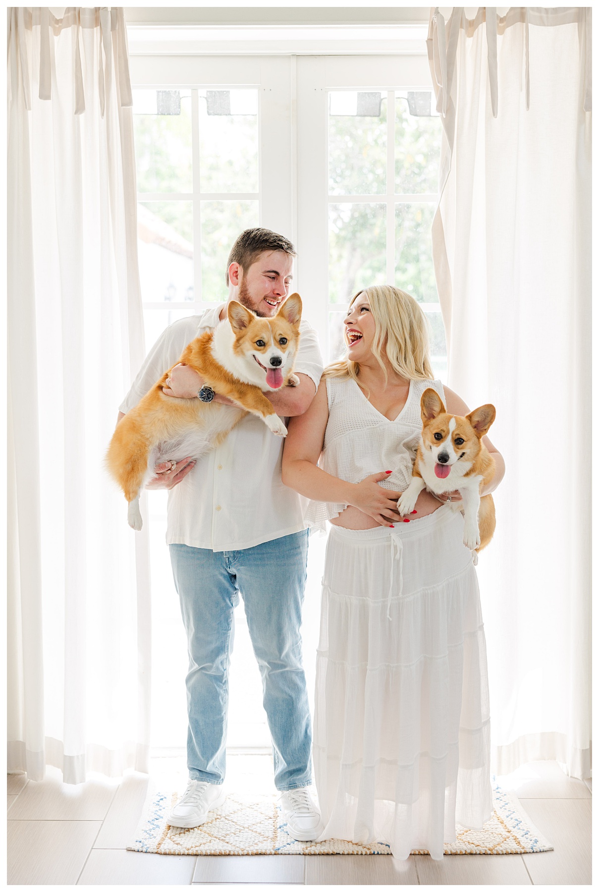 Hannah and Andrew with their dogs for their studio maternity photo shoot at The Rich Hippies House