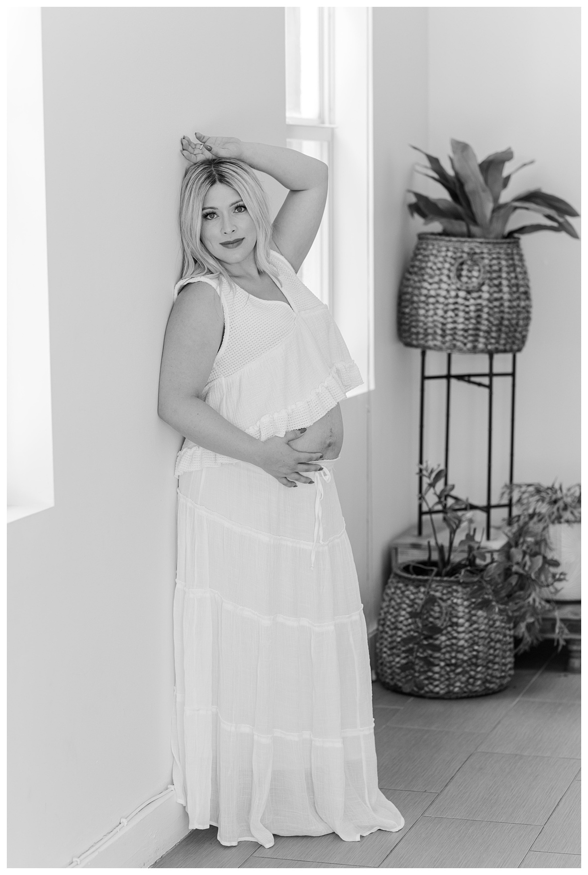 Hannah posing for her studio maternity photo shoot at The Rich Hippies House