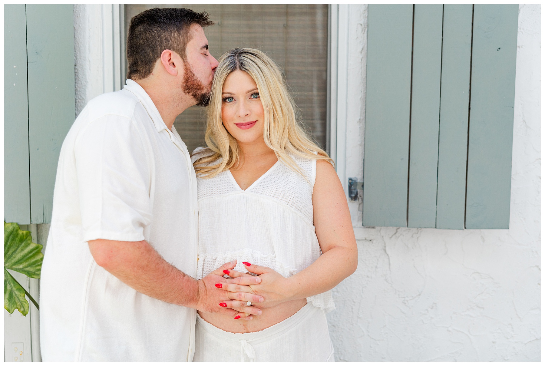 Hannah and Andrew pose   for their studio maternity photo shoot at The Rich Hippies House