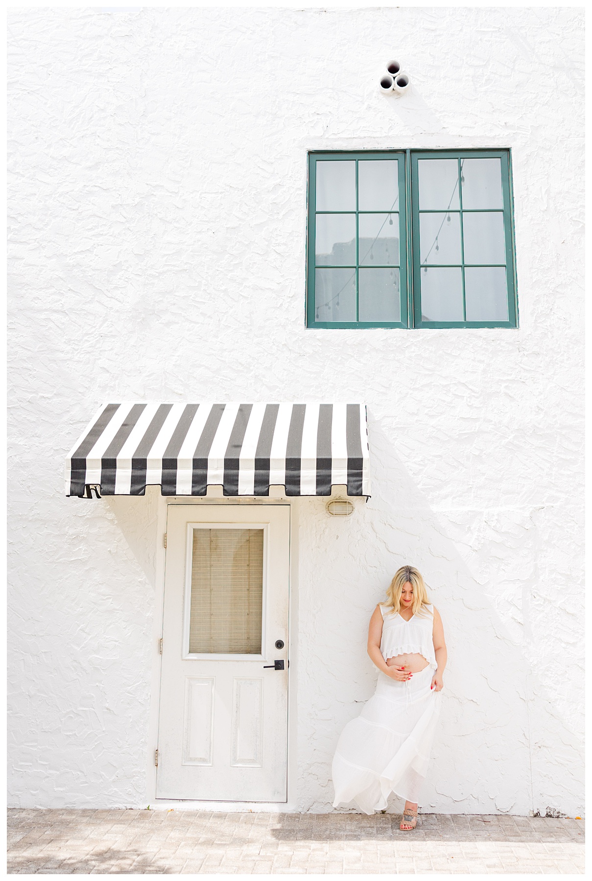 Hannah and Andrew pose   for their studio maternity photo shoot at The Rich Hippies House