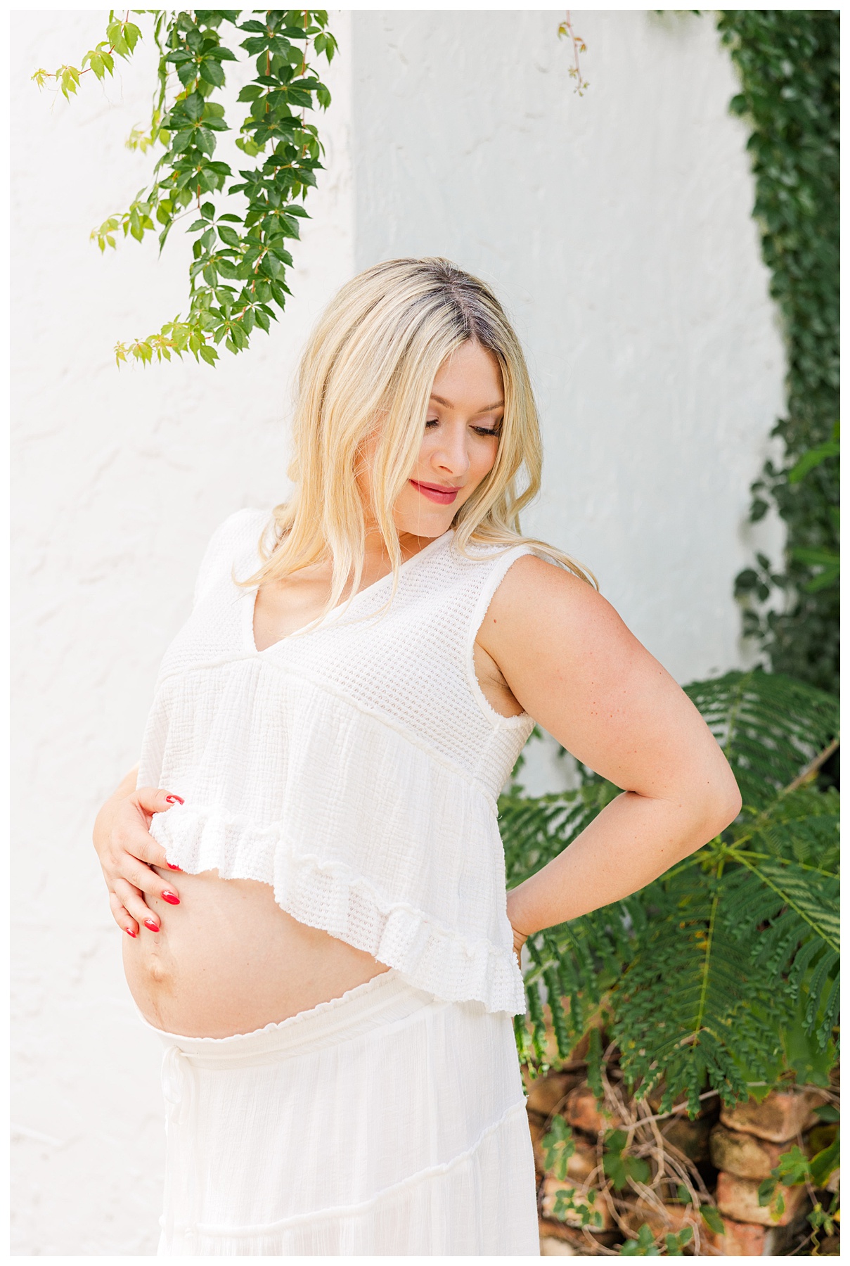 Hannah and Andrew pose   for their studio maternity photo shoot at The Rich Hippies House