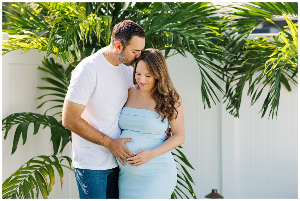 At home maternity session by the pool.