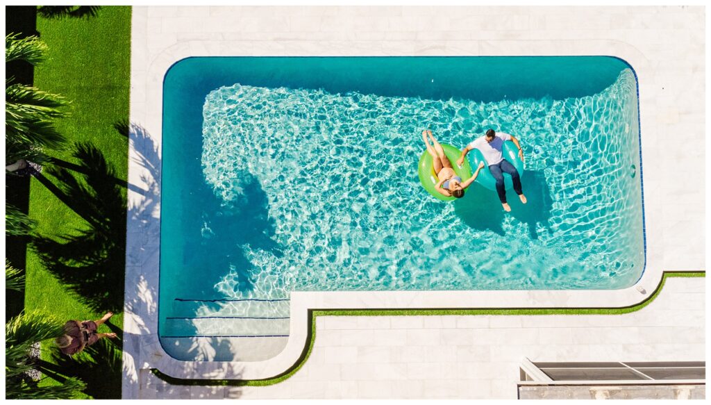 Drone shot of a pool side maternity session