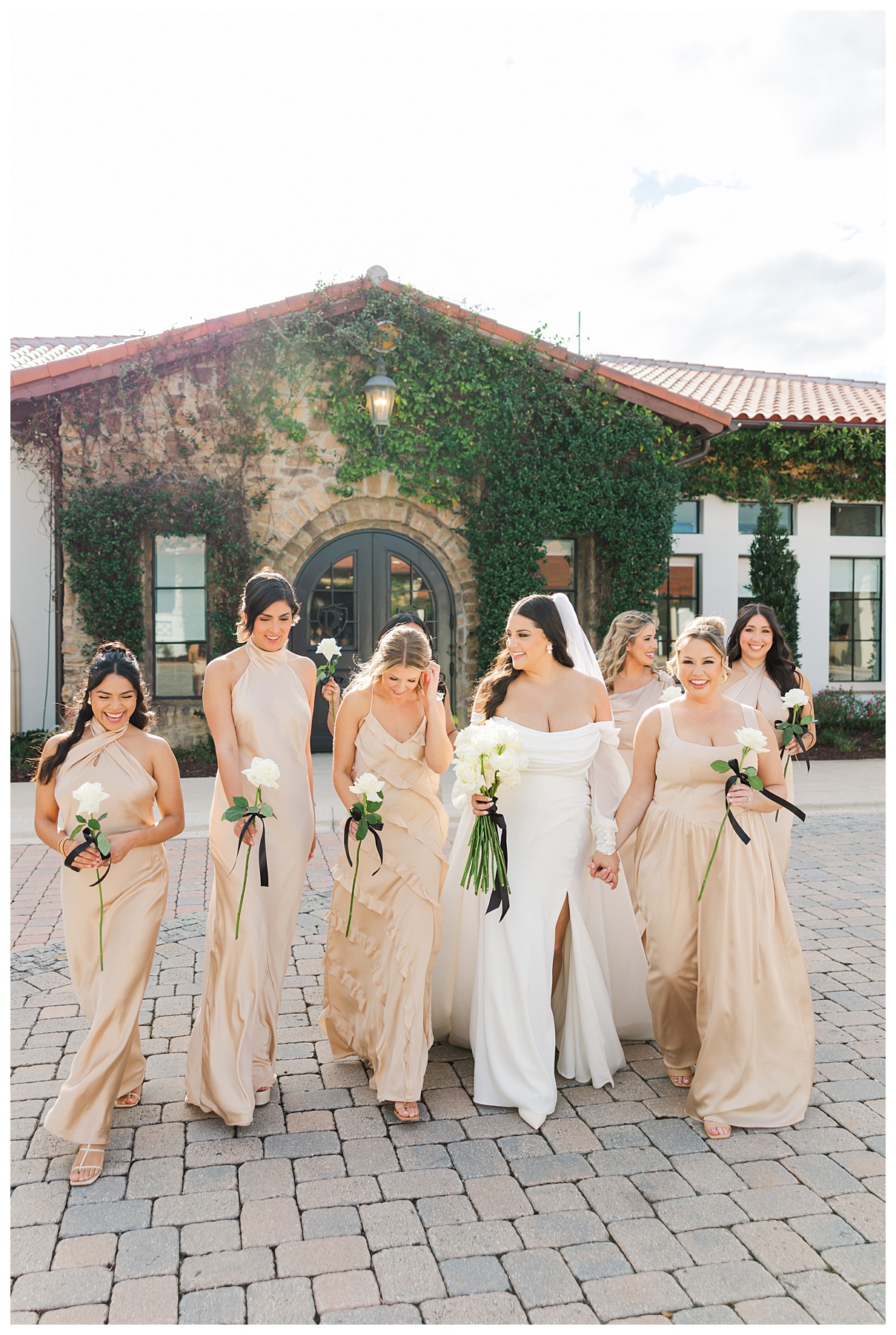 The bridesmaids strut their stuff during bridal party portraits