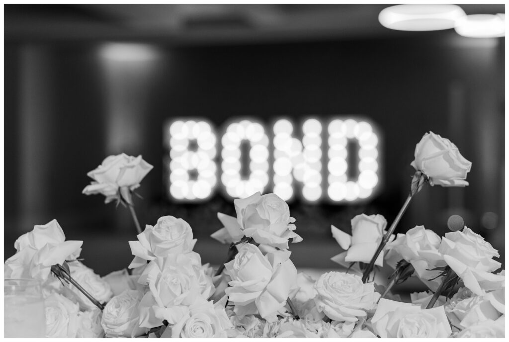 Reception details Bride and groom stand on the staircase at The Parkland Golf & Country Club included disco balls and white florals