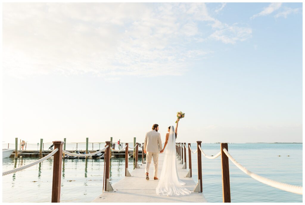 Bakers Cay Key Largo Bride and Groom just married portraits on the dock