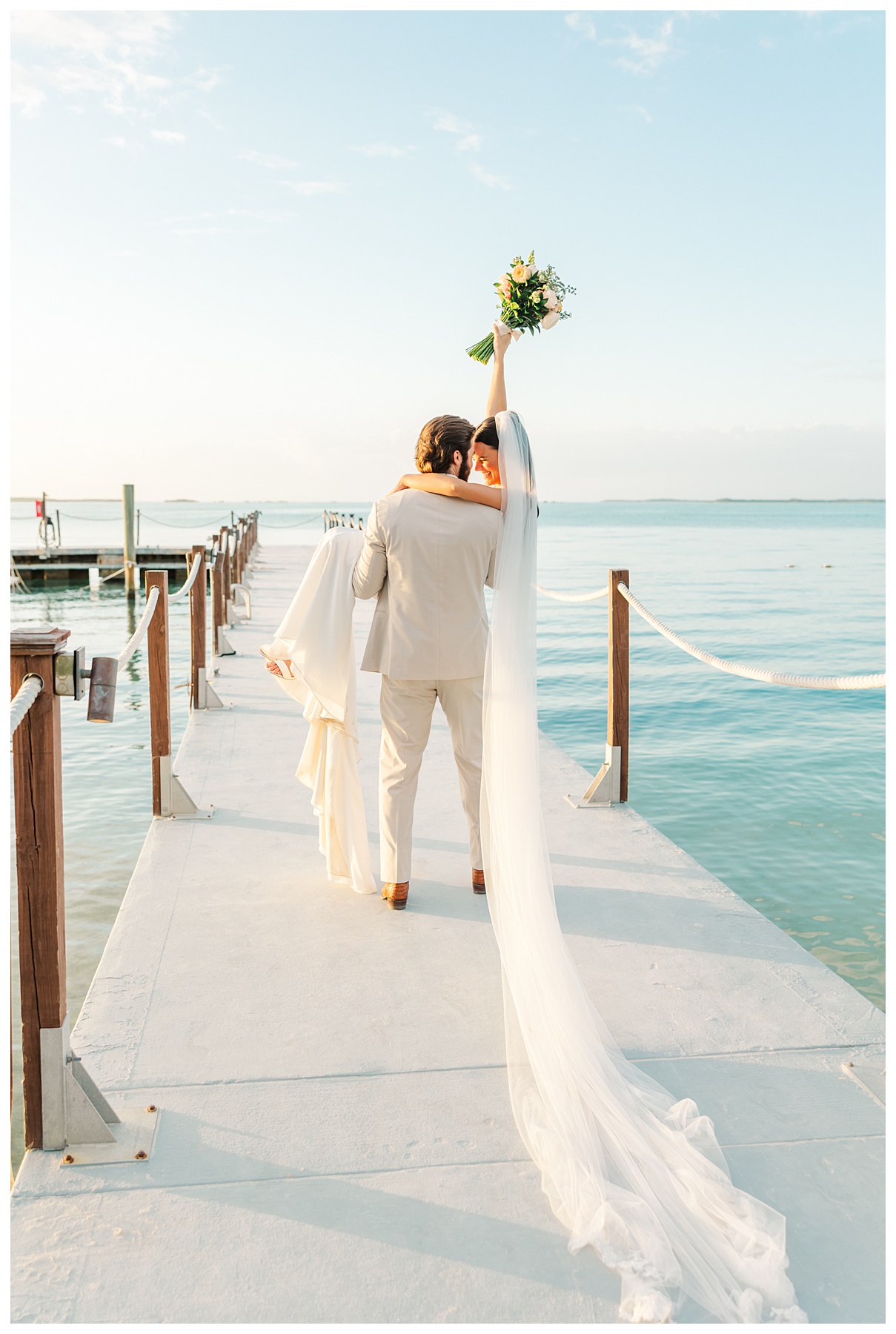 Bakers Cay Key Largo Bride and Groom just married portraits on the dock