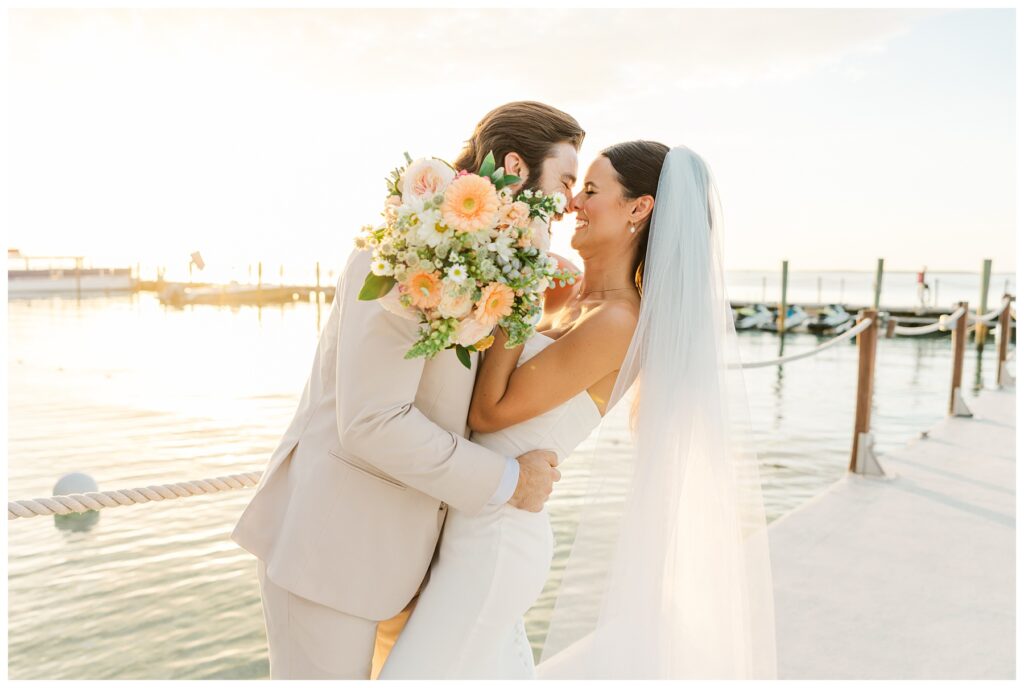 Bakers Cay Key Largo Bride and Groom just married portraits on the dock