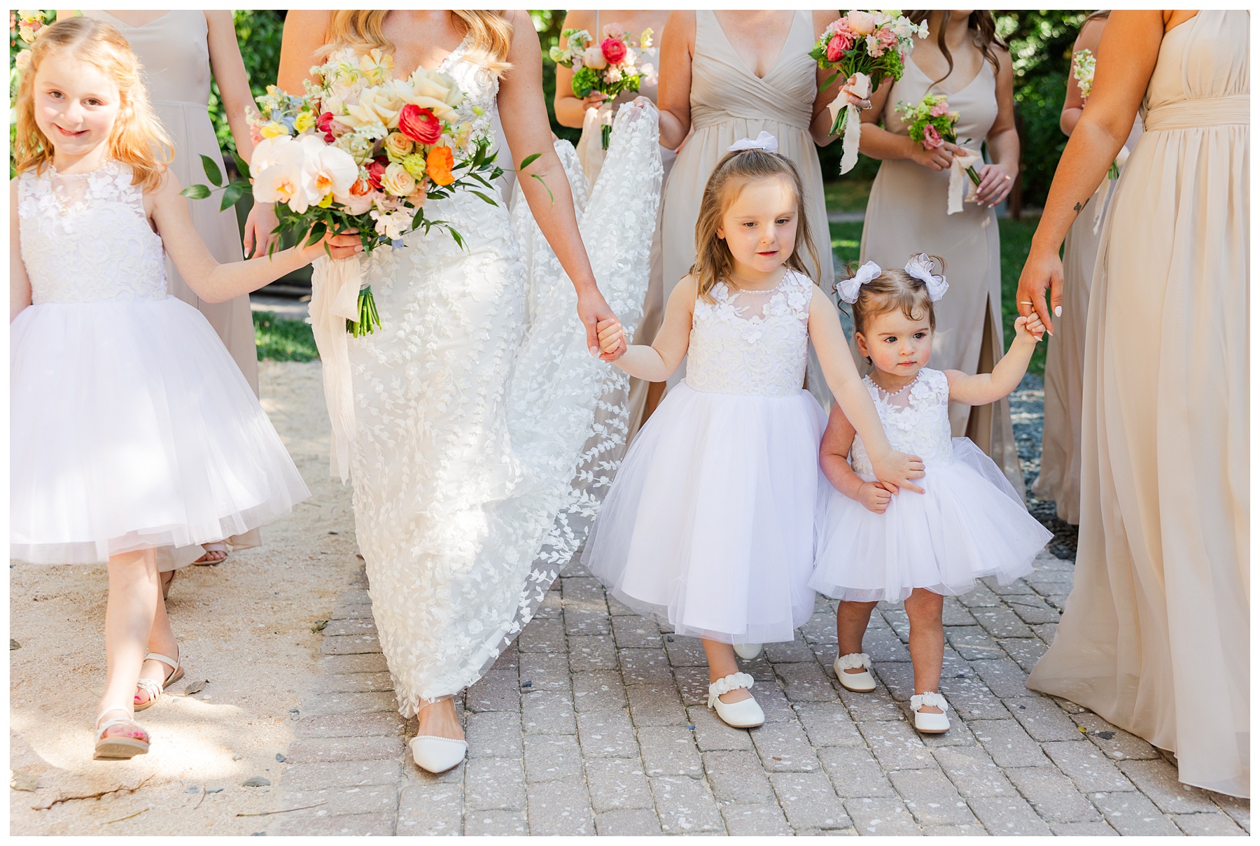 Bridal Party and flower girls walking at Playa Largo