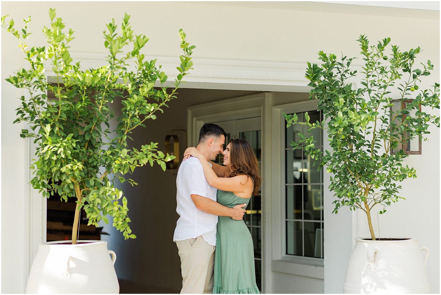 Carolina and Brian are dressed to impress for their engagement photos on Palm Beach Island