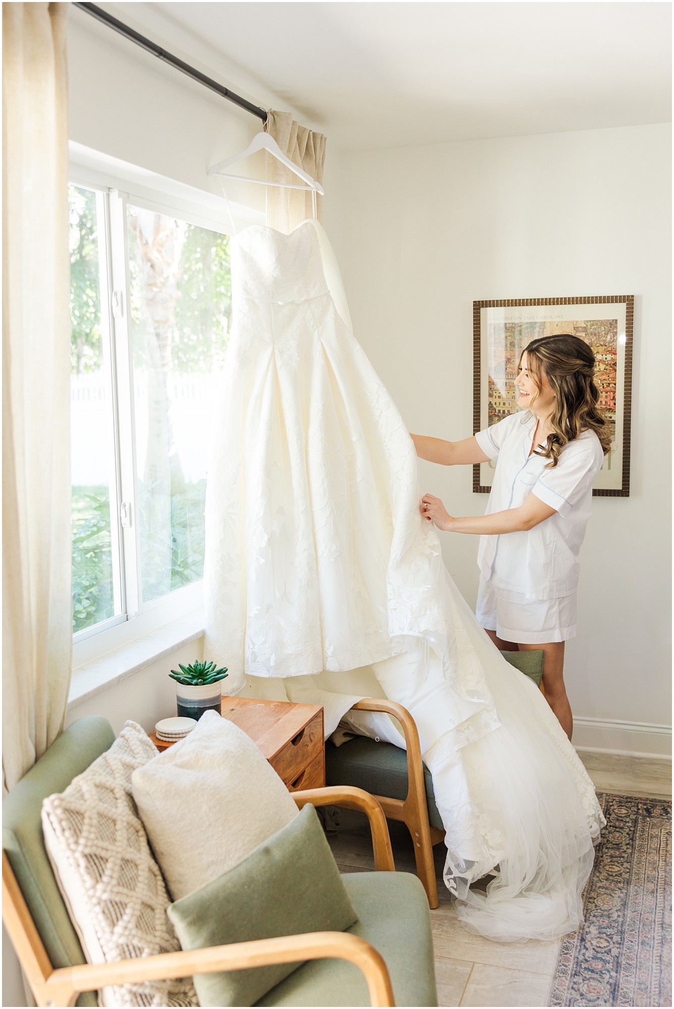 Bride looking at her wedding dress