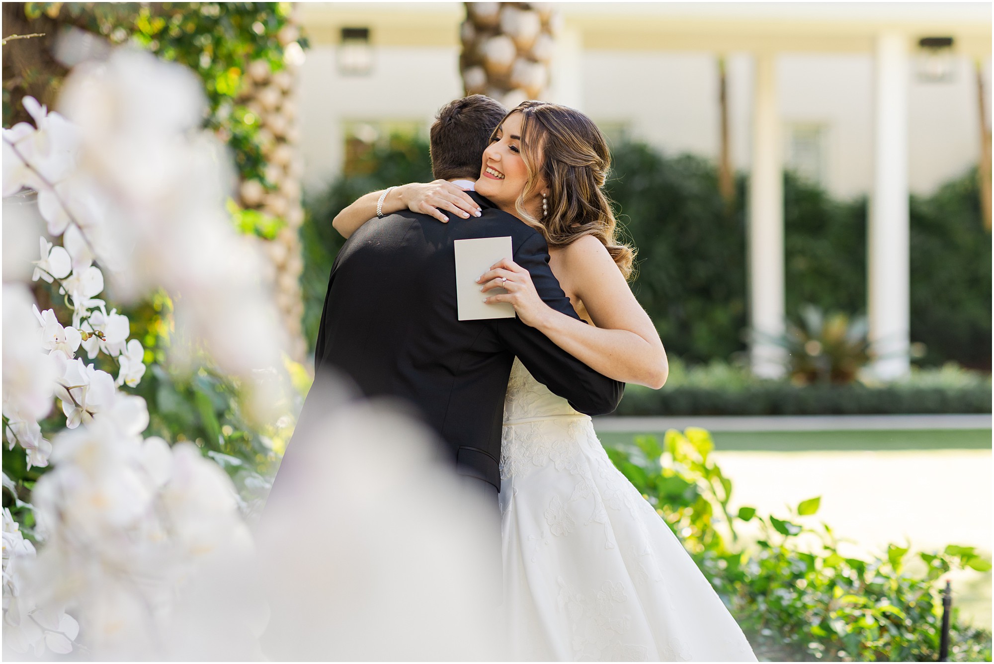 bride and groom exchange vows at Pelican Club