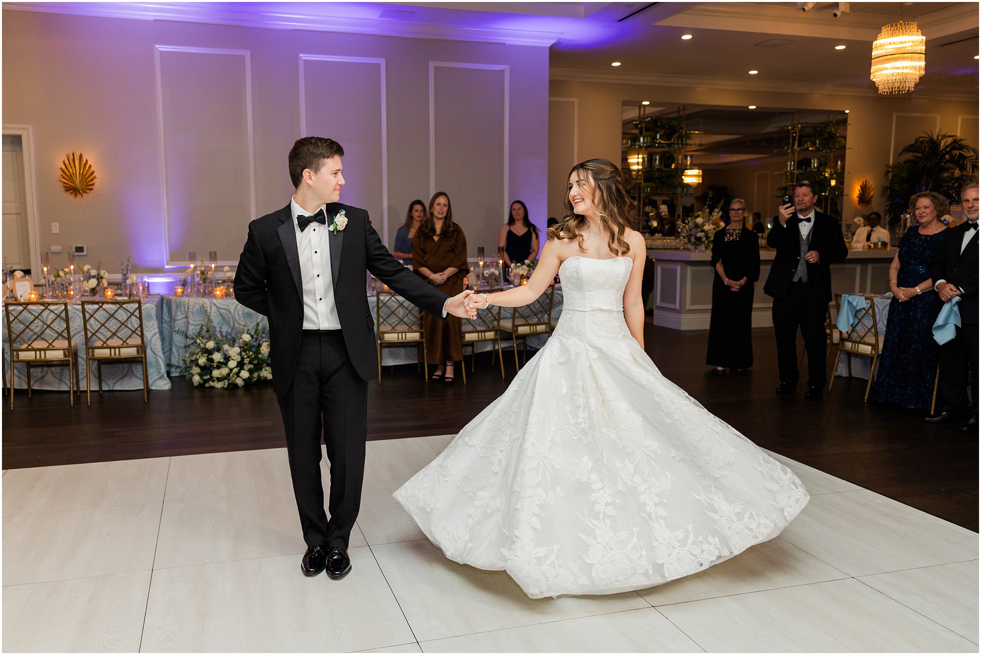 bride and groom first dance at Pelican Club wedding reception