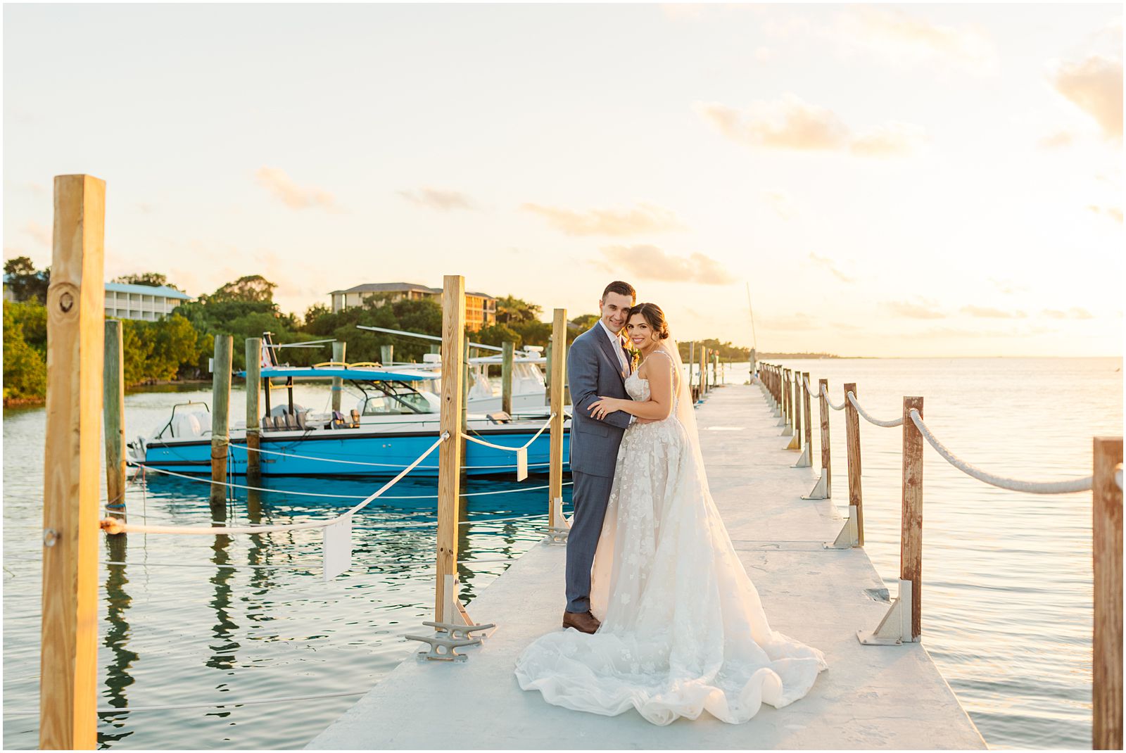 bride and groom sunset portraits on the dock in Key Largo